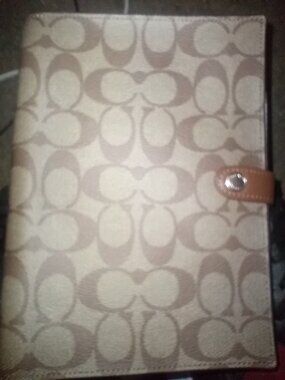 Coach notebook with paper